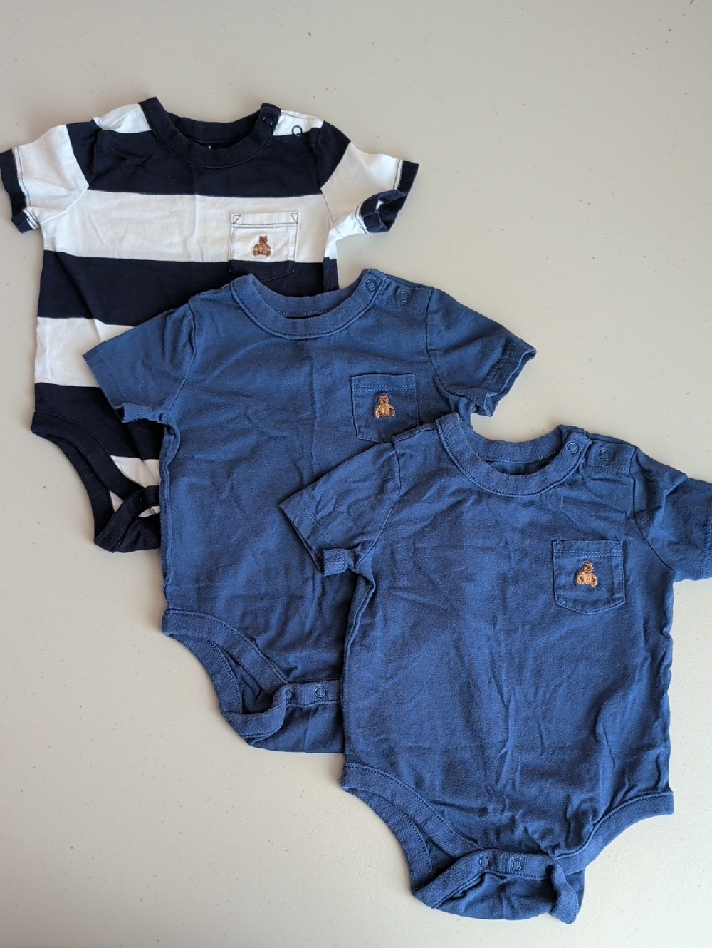 GAP Baby Short-Sleeve Onesies in Navy and White Stripe